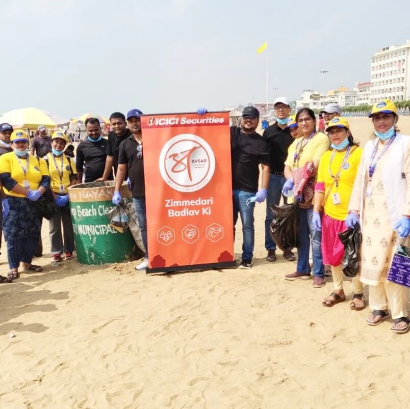 Child Help Foundation volunteers with ICICI Securities during a CSR beach cleanup drive.