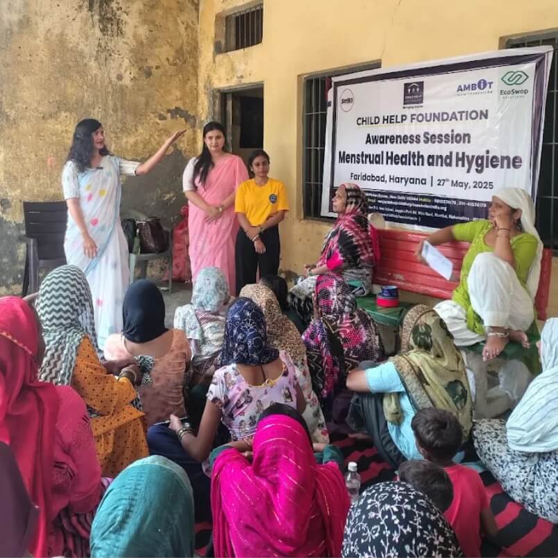 Child Help Foundation conducts a menstrual health and hygiene awareness session for women in Faridabad, Haryana, with participants gathered to learn about menstrual hygiene practices.